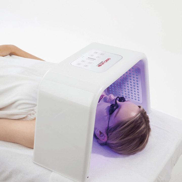 client having blue light LED therapy treatment